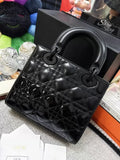 Dior Lady Dior bag in matte black with calfskin and patent leather accents